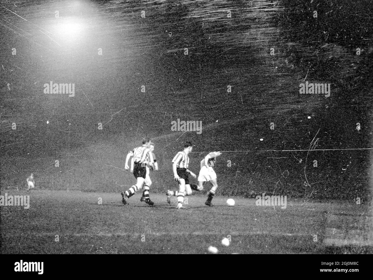 The Busby Babes make wonderful come back in their first match since Munich The new Manchester United Captain Billy Foulkes and his team at the Old Trafford Ground last night for the cup match against Sheffield Wednesday He and Harry Gregg the only Manchester United players of the original team to take the field following the tragic crash and famous referee Alf Bond 20 February 1958 Stock Photo