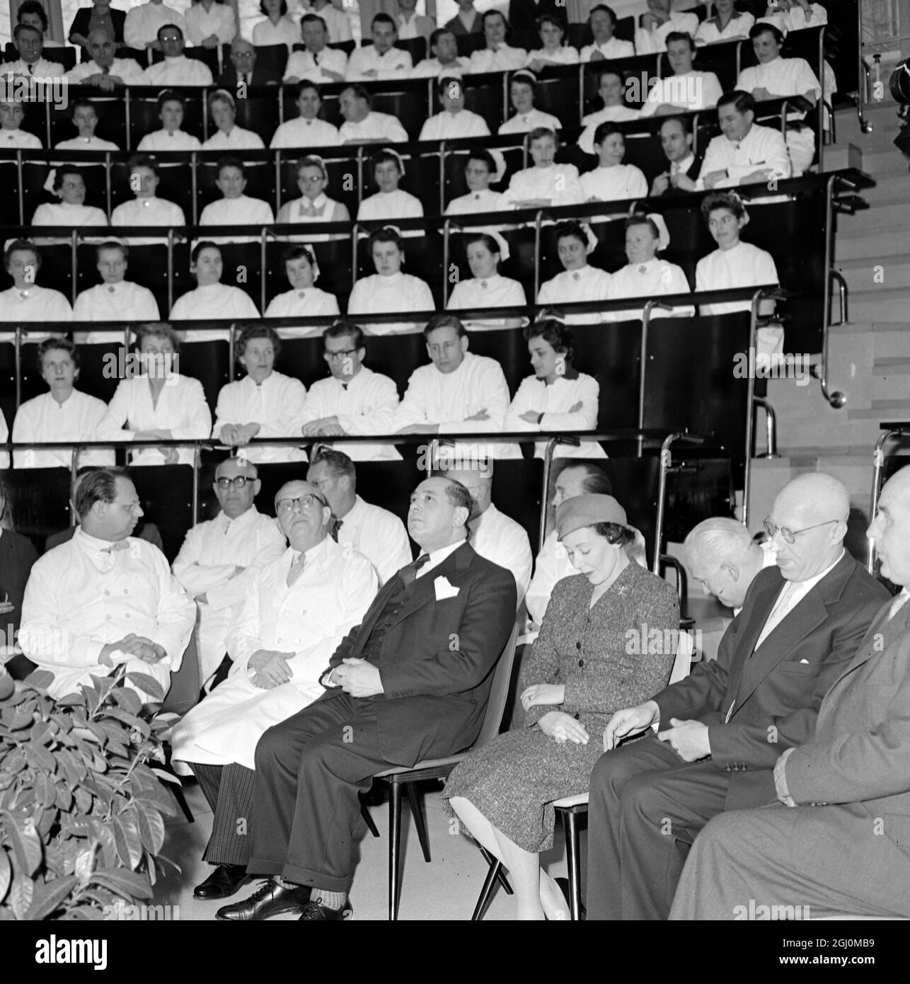 First Row Left to Right Professor Mauer Dr Herbert Gunter Kuhne the director of the hospital Lord Mayor Leslie Lever of Manchester England and his wife Mrs Lever and Mr Hamm municipal director of the Munich Hospital 12 March 1958 Stock Photo