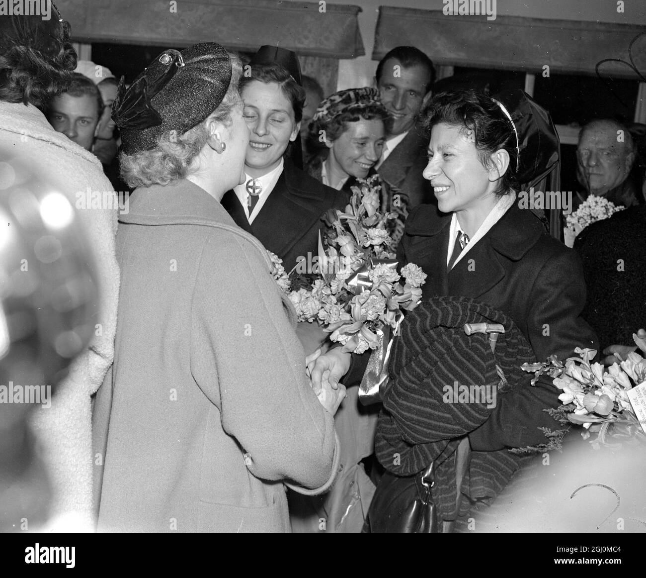 Group of doctor and nurses arrived in Manchester and give warm welcome in appreciation for Munich Hospital that helped the Manchester United Football team in the Munich air crash. 8th March 1958. Stock Photo