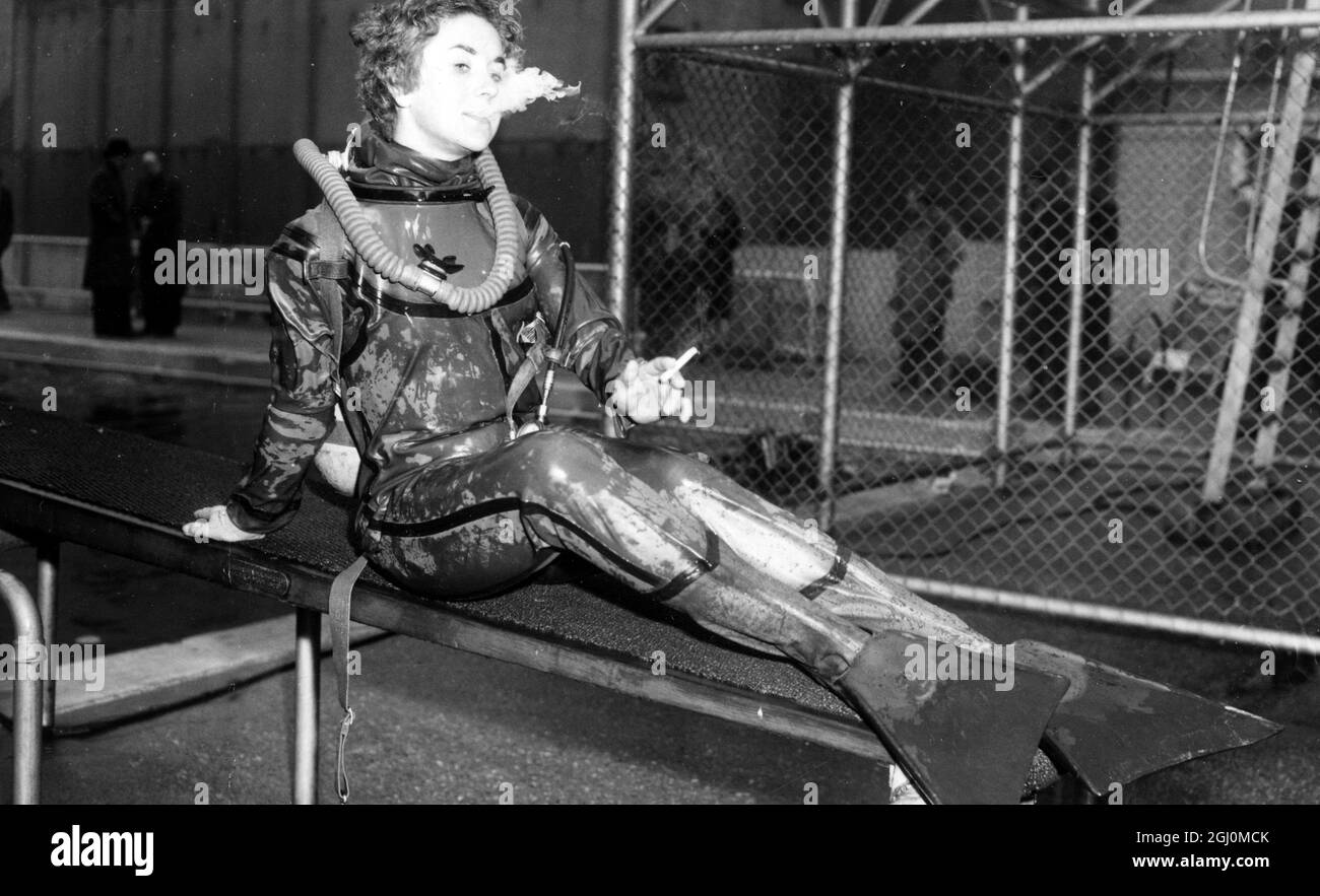 London England Exhibition Underwater Equipment 25 year old Rowena Ker of Stourbridge Worcestershire in frogman outfit . 25 March 1958 Stock Photo