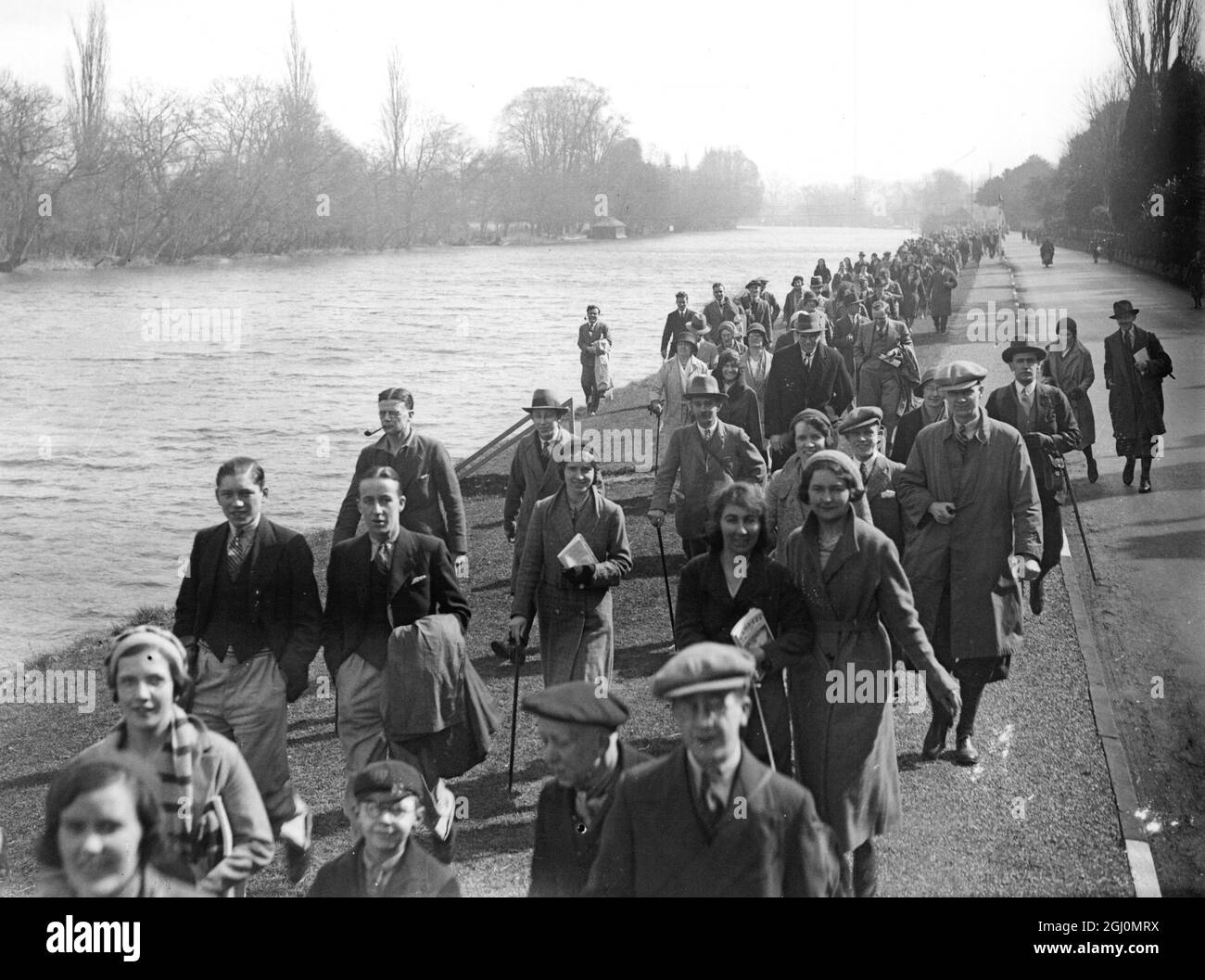 An astonishing number of ramblers joined the Hikers Mystery Expressto be dropped by the Thames at Pangbourne , Berkshire , for a day's walking , before catching the special train back to London . 25 March 1932 Stock Photo