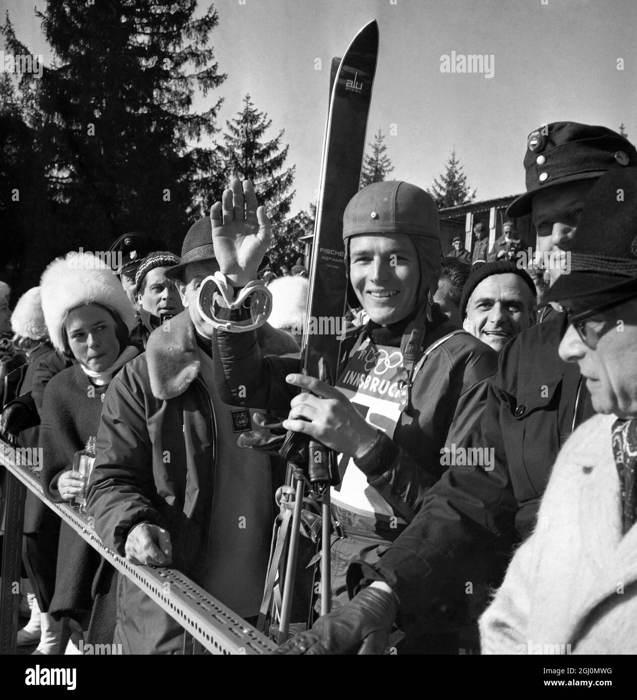 Austrian champion Egon Zimmermann after he had completed the Olympic men ' s downhill course on the Paterschkofel in 2 : 18 . 6 to win the event and the gold medal . 1 February 1964 Stock Photo