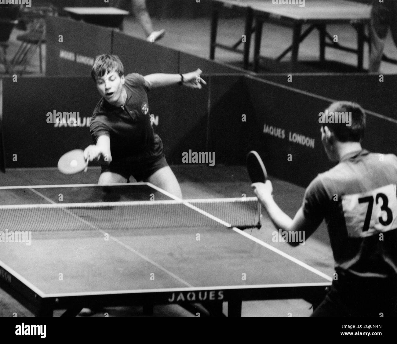 Sweden ' s wonder boy of table tennis , Kjell Johansson , current holder of the Men ' s Singles Title and No. 1 seed this year , is photographed in action at the Empire Pool , Wembley , during his game with Bulgaria ' s Peter Velikov ( right ) , in the European Table Tennis Championships . Stock Photo
