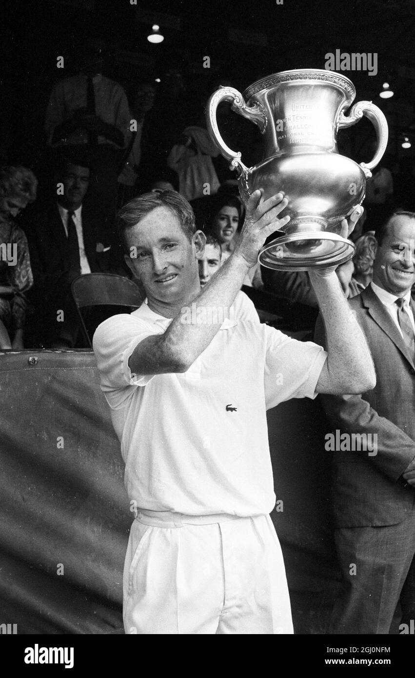 Australian Rod Laver holds the trophy high after winning the final of the American Lawn Tennis Championships at Forest Hills , New York , USA on 10 September . He beat fellow countryman Roy Emerson 6-2 6-4 5-7 5-4 . Red haired , 24 year old Laver holds the Australian , French , Wimbledon and US titles . 14 September 1962 Stock Photo