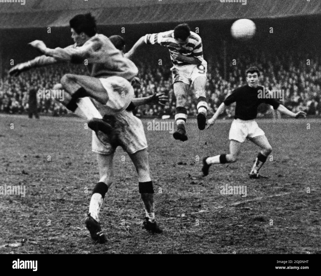 Glasgow ; Chalmers , ( No 9 ) heads in his second goal for Celtic during the Scottish League Division One match against Falkirk . The match resulted in a 7 - 0 victory for Celtic . 6 January 1964 Stock Photo
