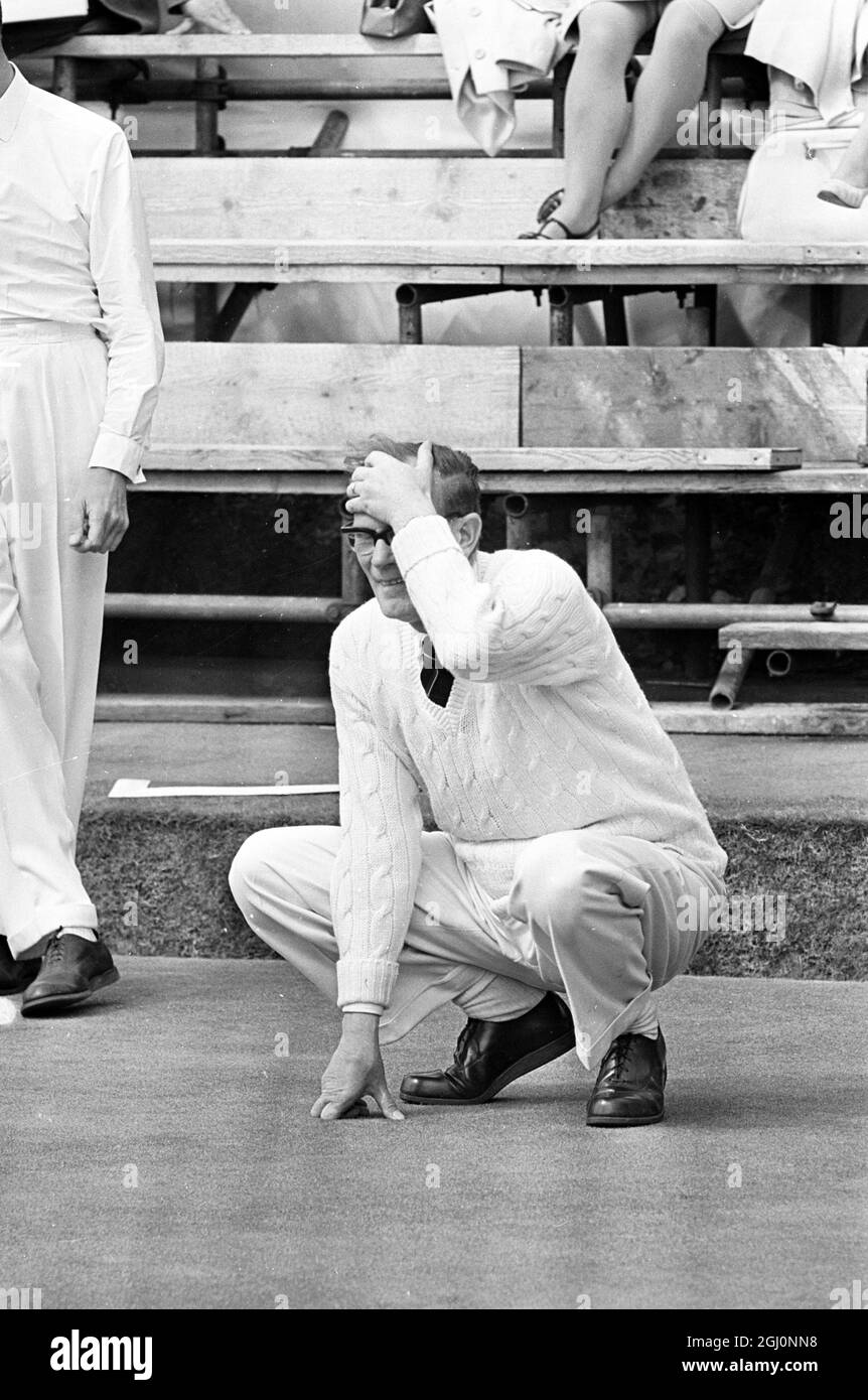 Walter Coulson , a member of the Leicester B team , puts a hand to his head during a tense moment in the match . Walter is pictured while playing in the annual National Bowling Championships , Mortlake , London , England . 17 August 1967 Stock Photo