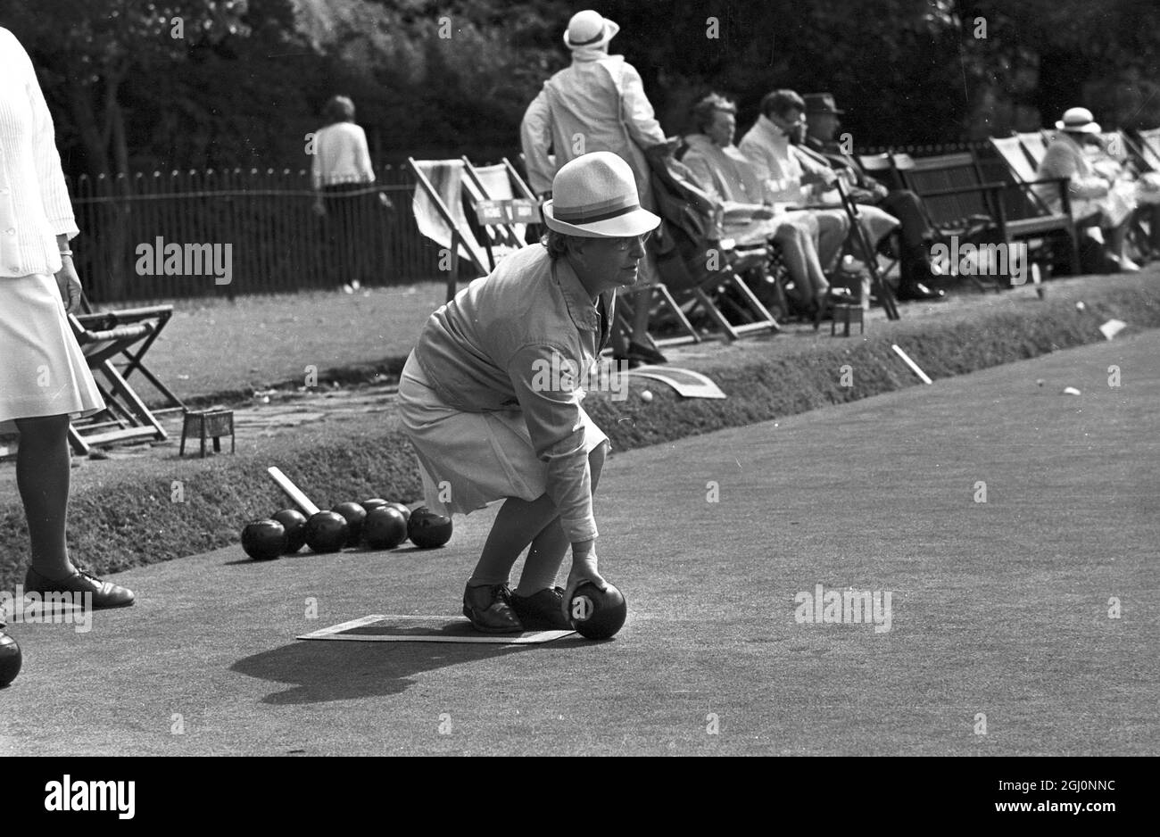 Doris Burton , of Durham , prepares to pitch the wood , at the Amateur National Championships of the English Women's Bowling Association at Wimbledon Park , London , England . 25 August 1969 Stock Photo