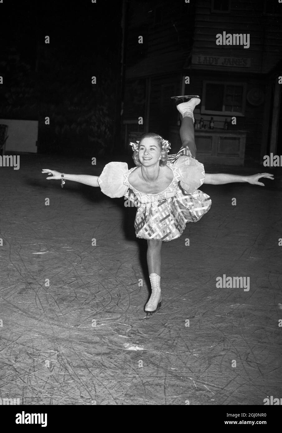 Barbara Ann Scott Canadian Ice skater glides across the rink during rehearsals for the new show Rose Marie on Ice , which opens at Harringay on 4th July 27th June 1951 Stock Photo