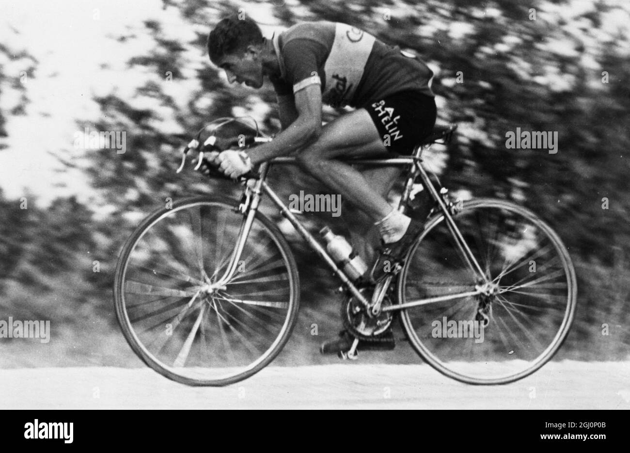 Action picture of Federico Bahamontes , Spanish cycling ace , who dead heated for the tenth position with 51 points . 29 December 1959 Stock Photo