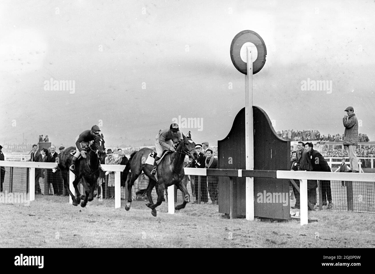 American amateur jockey , Crompton ( Tommy ) Smith 27 , of Little Middleburgh , Virginia , up on Jay Trump (right) is shown winning the Grand National . The horse , trained by Fred Winter of England , is owned by Mrs Mary Stephenson of Cincinnati , Ohio . Second was Freddie ridden by Pat McCarron , Aintree , Liverpool , England . 27 March 1965 Stock Photo