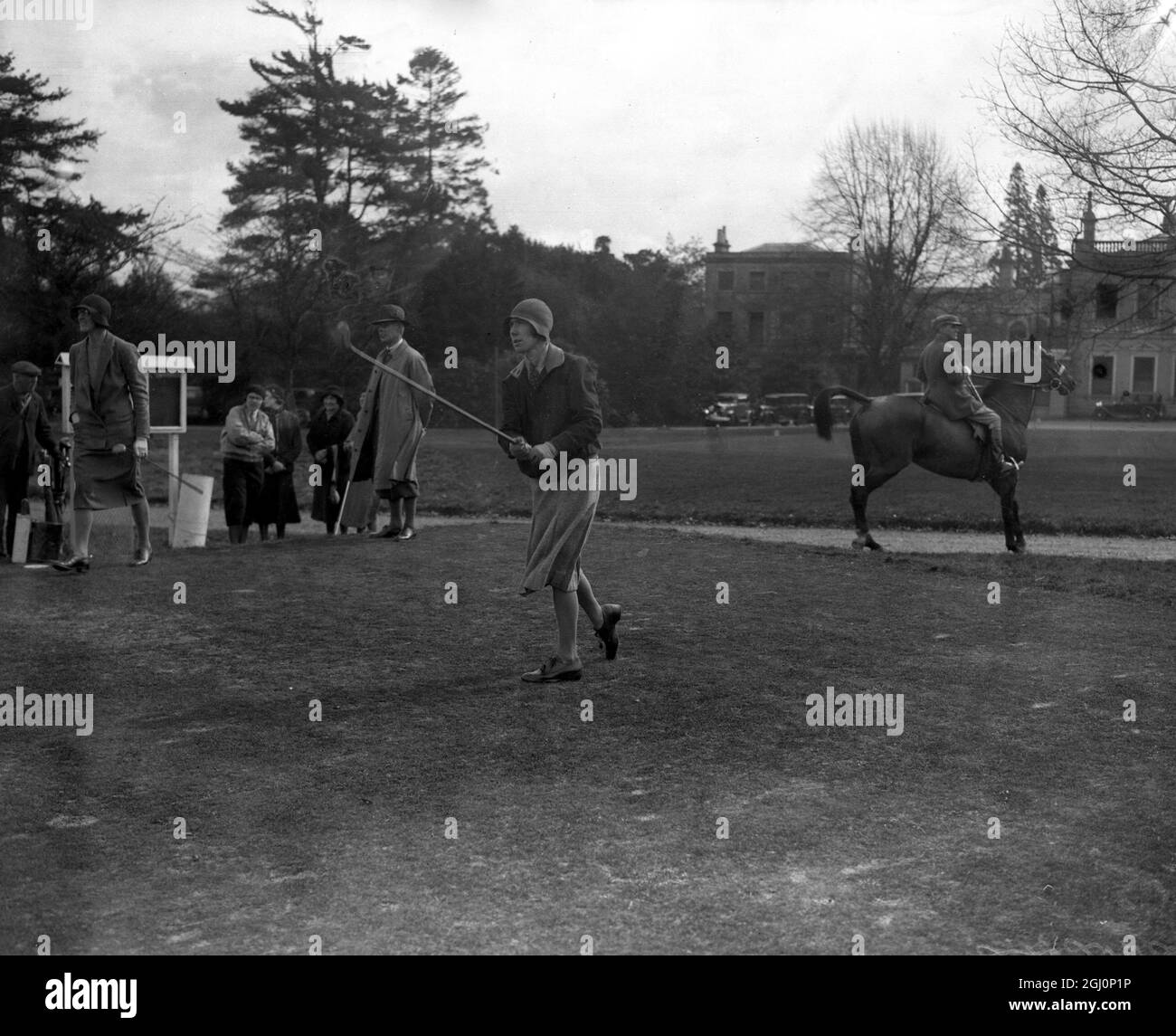 Famous sportswomen met on the Burhill course , Surrey , for the Ladies Open meeting at the Women ' s Amateur Sports Association challenge trophy . Photo shows ; Miss J Hughes in play during the match . 31 March 1932 Stock Photo