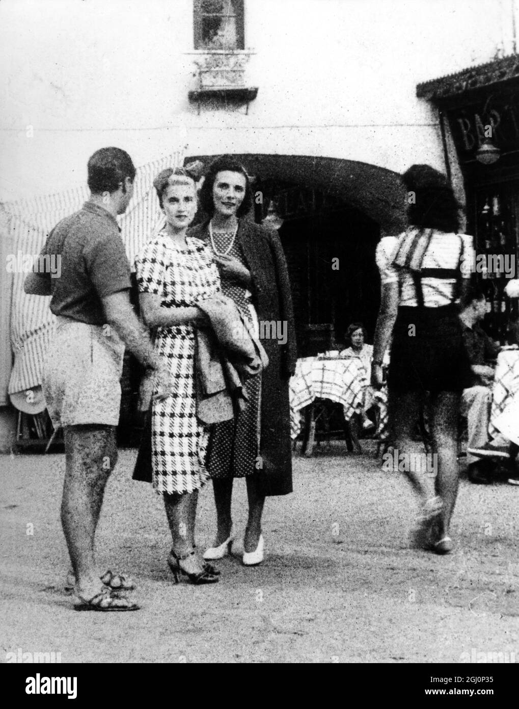 Countess Reventlow leaves Capri owing to war danger . Because of the war danger , in which Italy is concerned , Countess Haugwitz Reventlow , formerly Barbara Hutton the Woolworth heiress , has left the Isle of Capri where she has been on holiday . Photo Shows ; Countess Haugwitz Reventlow ( centre ) with Lance Strignano of Naples and Mrs Kennedy on her departure from Capri . 26 August 1939 Stock Photo