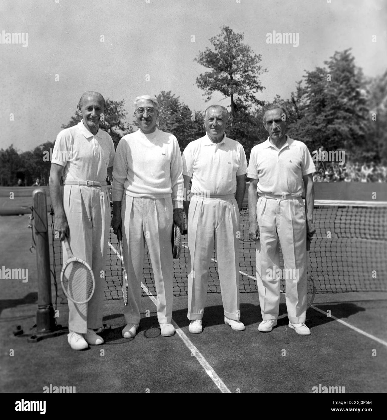 Davis Cup Winners reunion , Lys, Chantilly , near Paris : Four French tennis players are reunited 18 June 1967 , 40 years after they won the Davis Cup in Philadelphia in 1927 . Seen here before playing an exhibition doubles match , they are left to right Henri Cochet , Jacques Brugnon , Rene Lacoste and Jean Borotra . Stock Photo