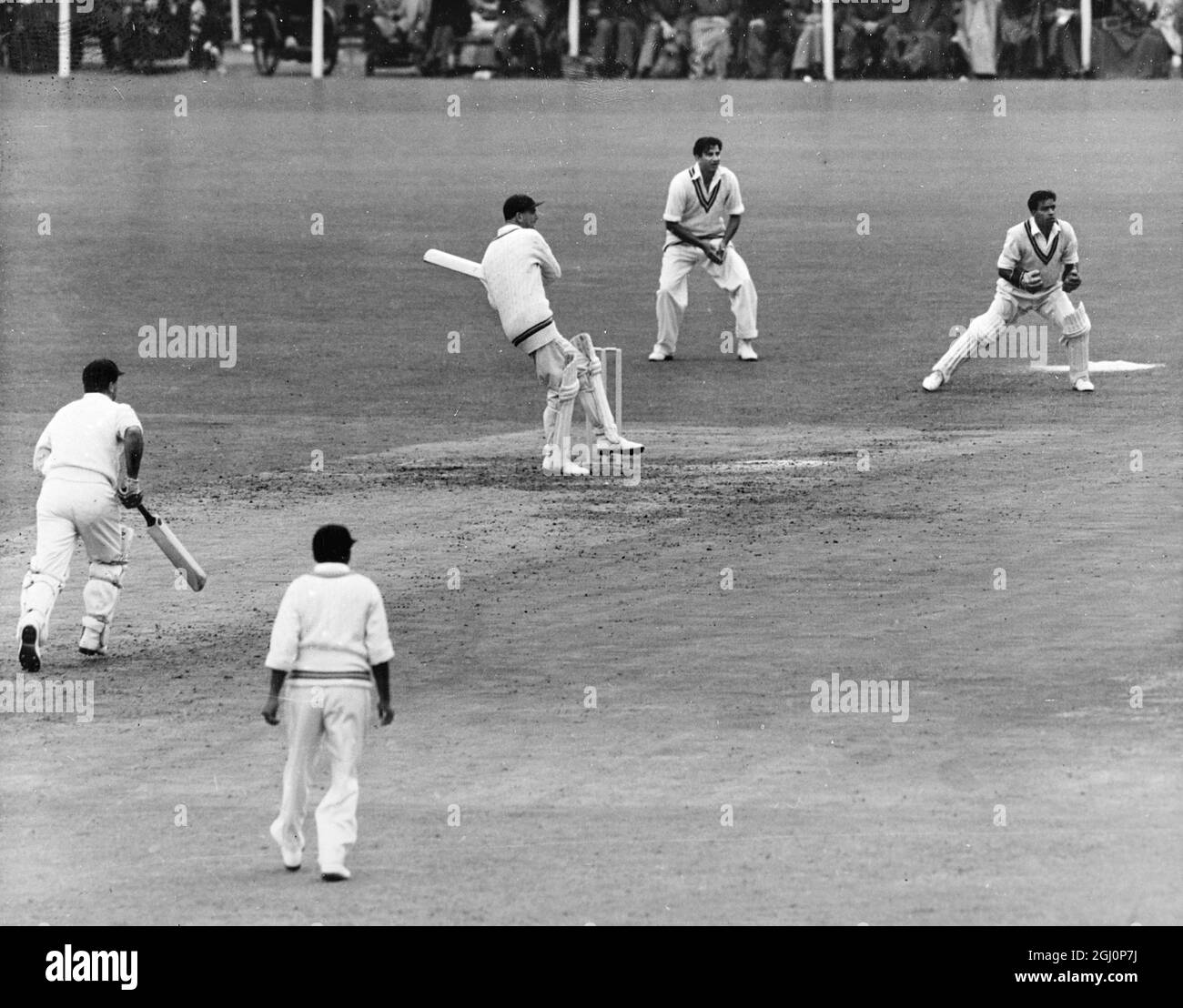 England v Pakistan at Old Trafford . Manchester ; England ' s TW Graveney pulls a ball from Mahmood during the test against Pakistan at Old Trafford , Manchester . Graveney made 65 before being stumped by Imtiaz Ahmed , bowled Shujauddin . 23 July 1954 Stock Photo