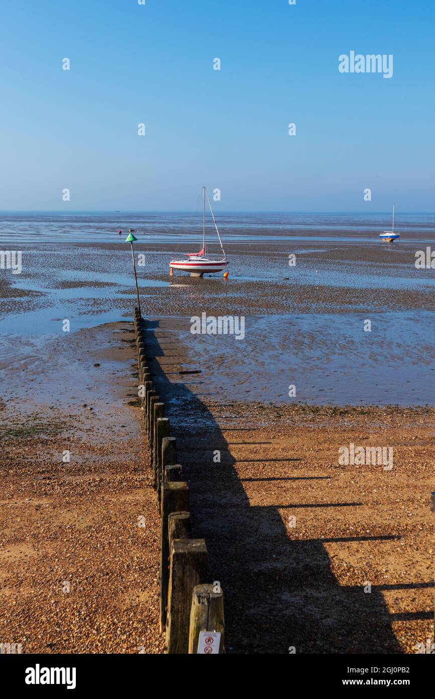 Yacht Named 'Pegasus' High and Dry during Low Tide at Thorpe bay on Thames Estuary on a Lovely Late Summer Morning Stock Photo