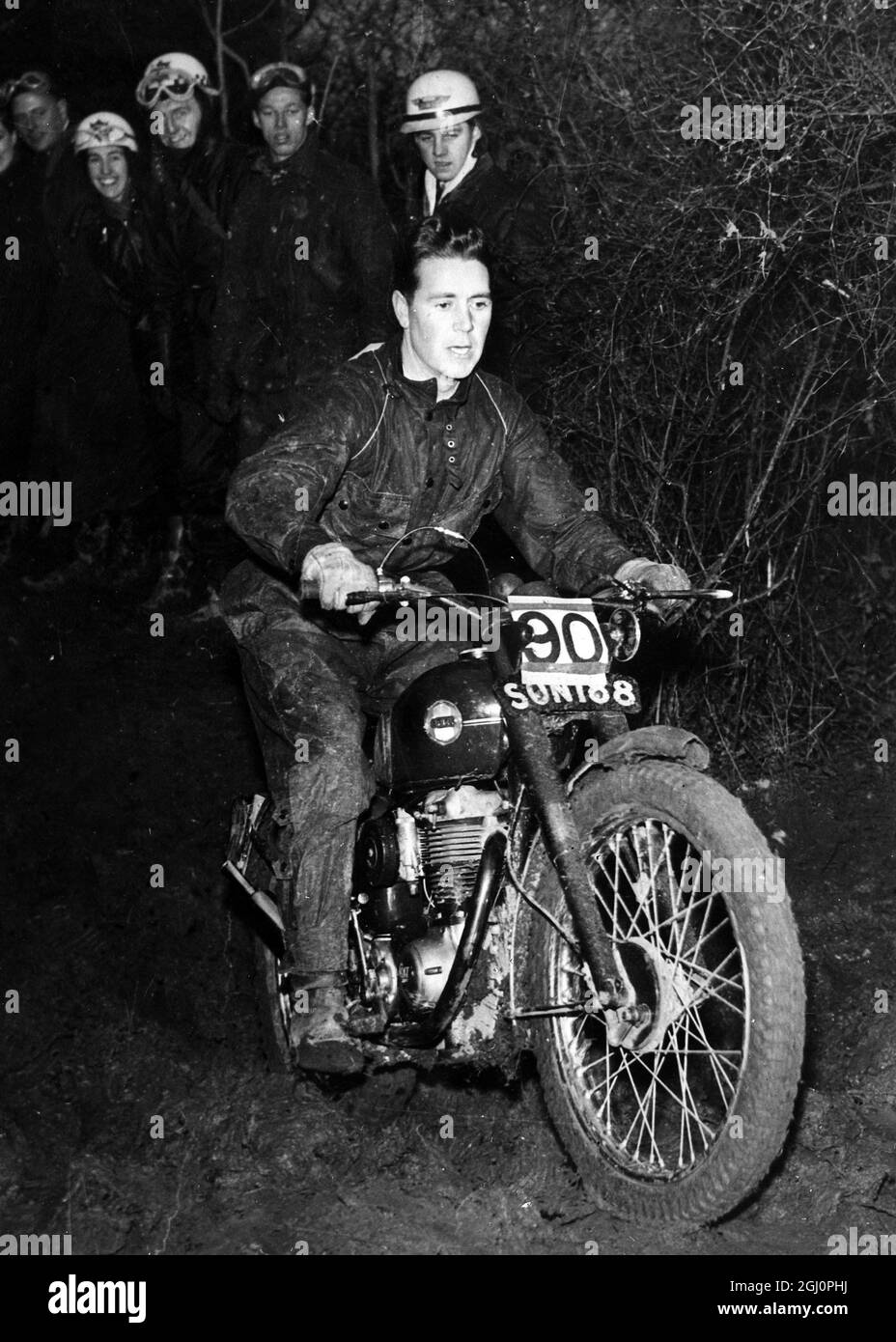 32-year-old Geoff Duke , world champion motor cyclist , in action at the Chester Motor Club 's Picton trial when he rode with 104 amateurs . 29 November 1955 Stock Photo