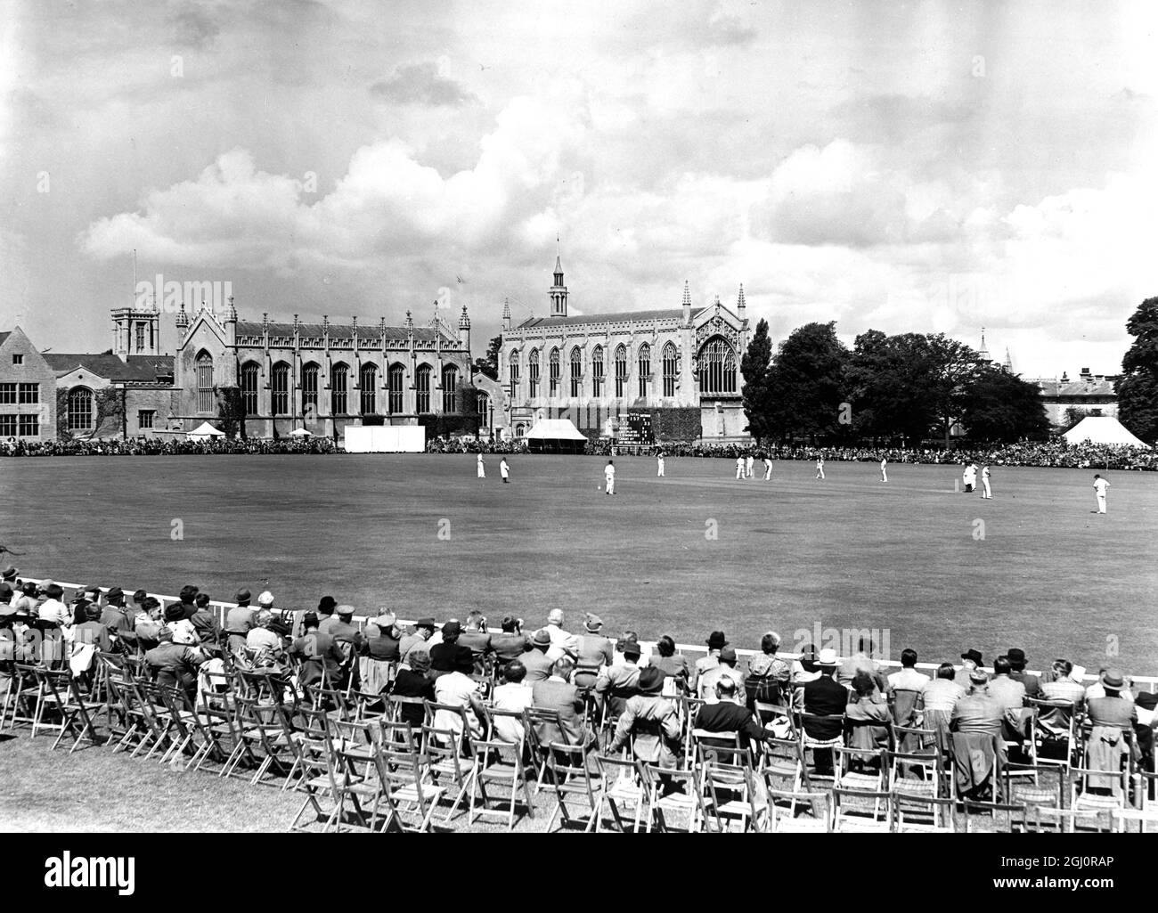 Gloucestershire V Kent Cheltenham Cricket Week Gloucestershire batting in their match with Kent which opened Cheltenham Cricket week, in the stting of Cheltenham college, with College buildings in the background 15th August 1951 Stock Photo
