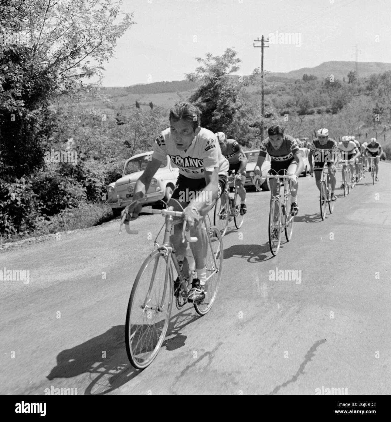 Viterbo , Italy : Denmark's Ole Ritter and Belgium 's Eddy Merckx ( centre) in action during the sixth lap of the Cycling Tour of Italy ( Giro d'Italia ) 22 May 1969 Stock Photo