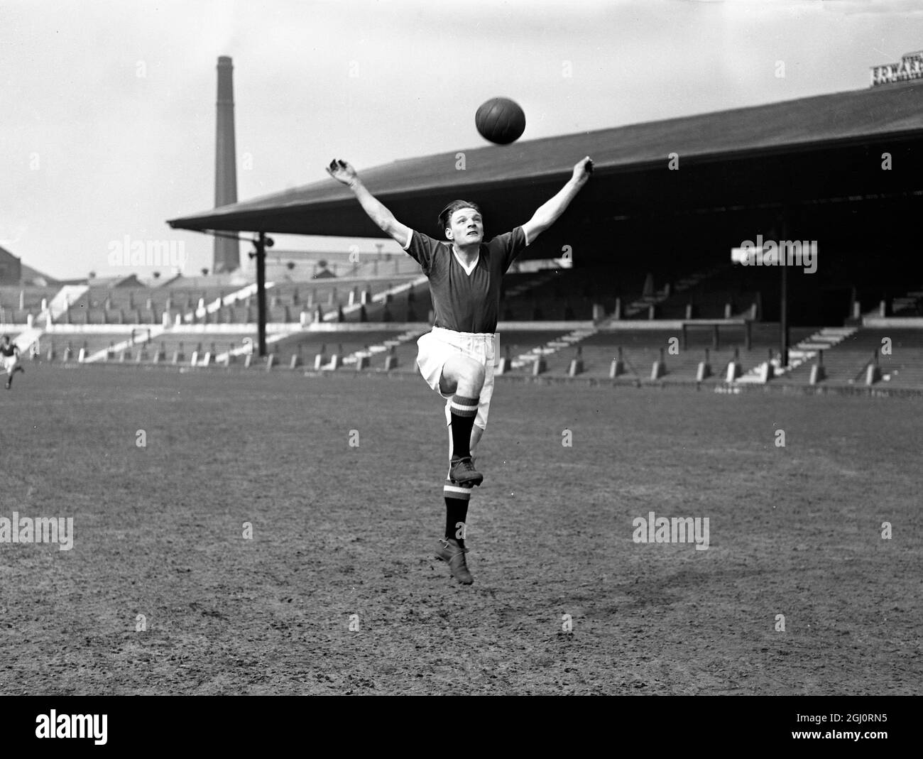 An action portrait of Mark Jones of Manchester United 1957 Stock Photo