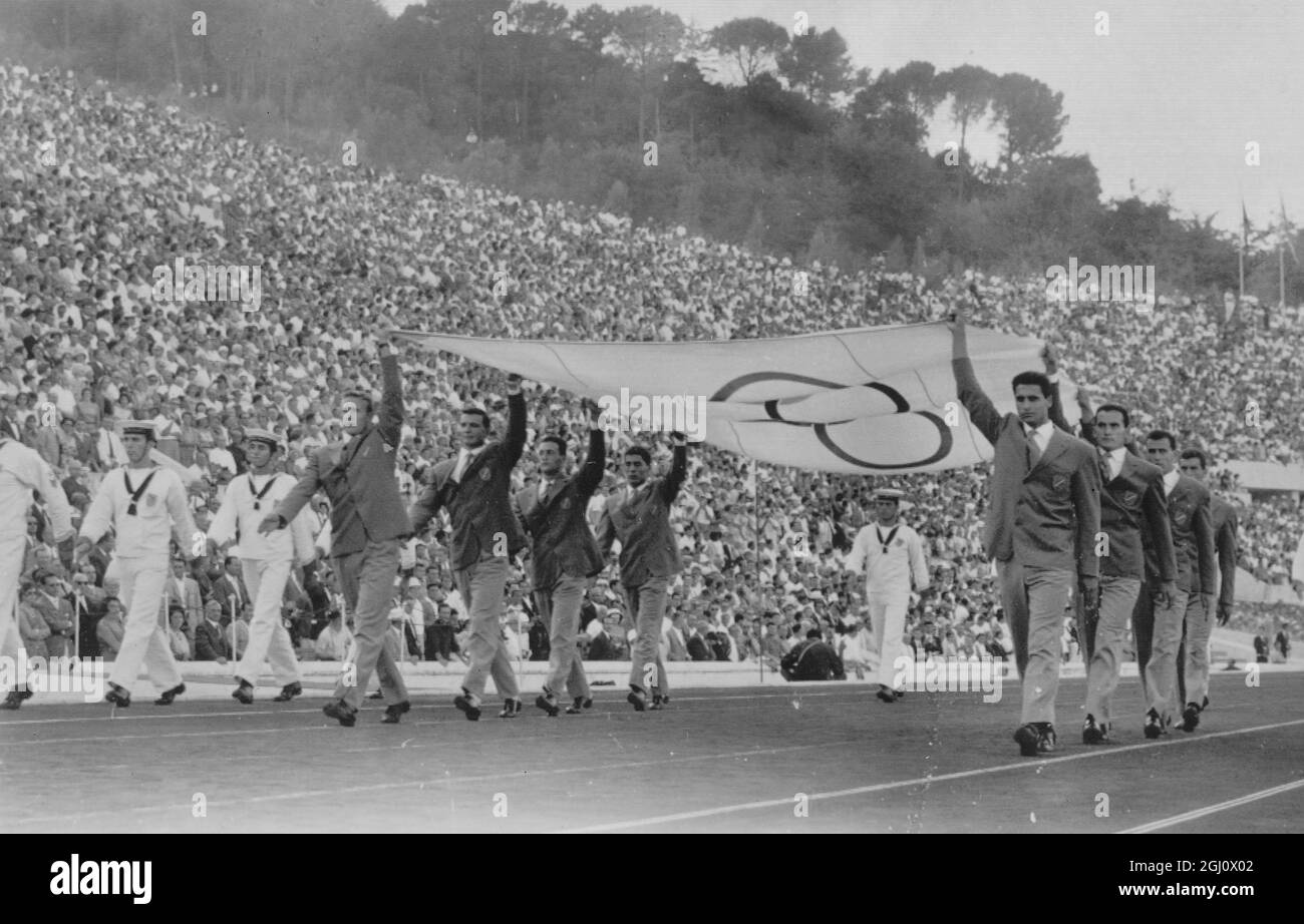 OLYMPIC GAME OPENING CEREMONY OLYMPIC FLAG PARADED ROUND STADIUM 25 AUGUST 1960 Stock Photo