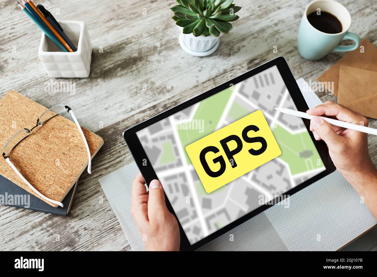 GPS Global Positioning System, Worldwide navigation and tracking concept with town maps on screen Stock Photo