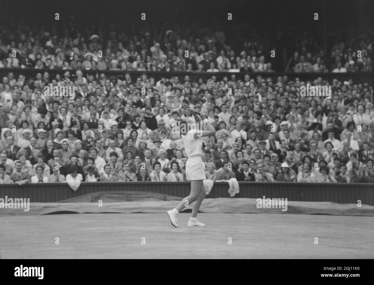 TENNIS WIMBLEDON FINALS PLAYER ANGELA MORTIMER HOLDS UP RACQUET 8