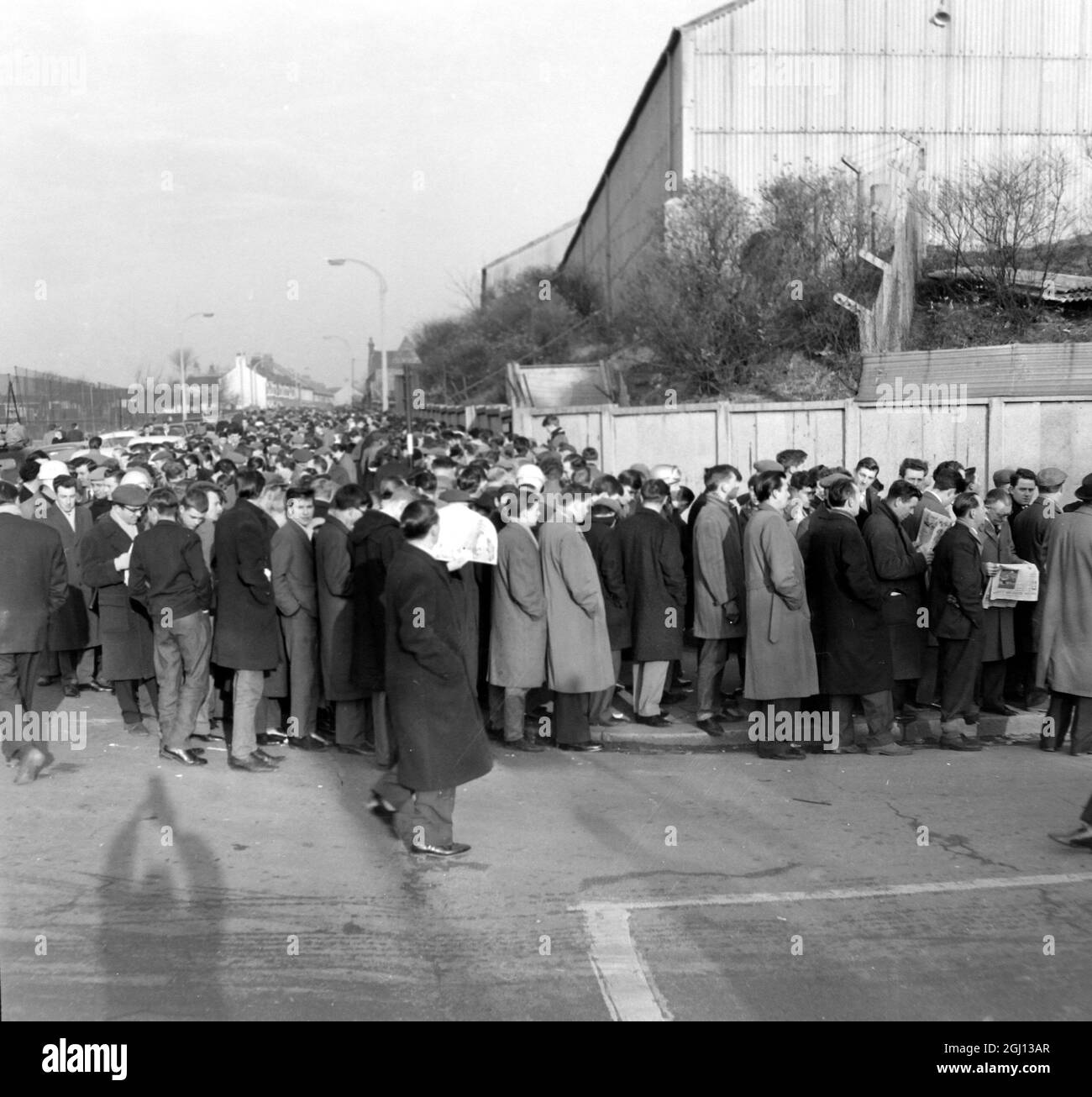 Fans queue black and white hi-res stock photography and images - Alamy