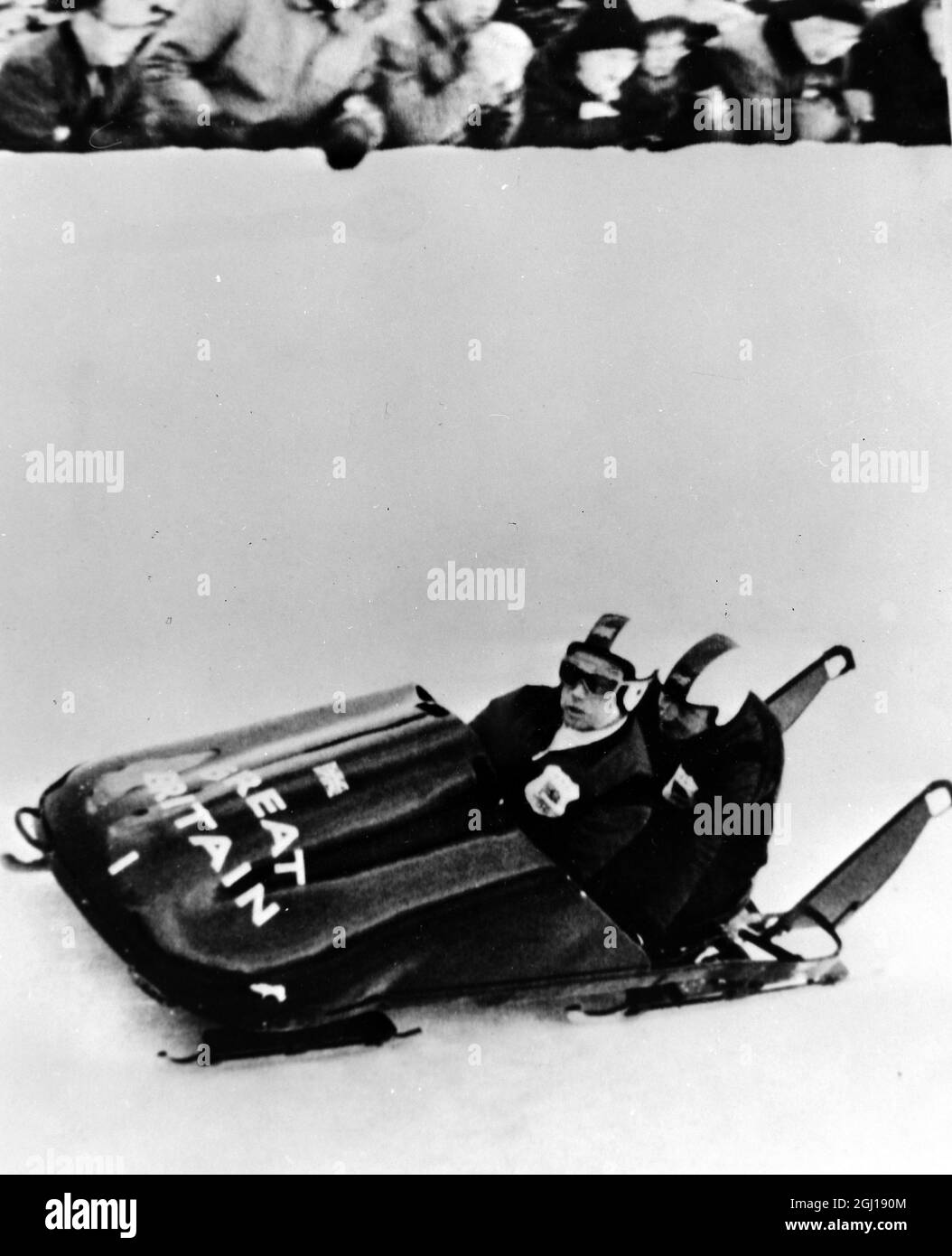 1 FEBRUARY 1964 ANTHONY NASH AND ROBIN DIXON ON THEIR WAY TO WIN THE GOLD MEDAL IN THE 2 MAN BOBSLEIGH, THE FIRST TIME BRITAIN HAS WON GOLD IN THE WINTER OLYMPICS SINCE 1952. IGLS, INNSBRUCK, AUSTRIA Stock Photo
