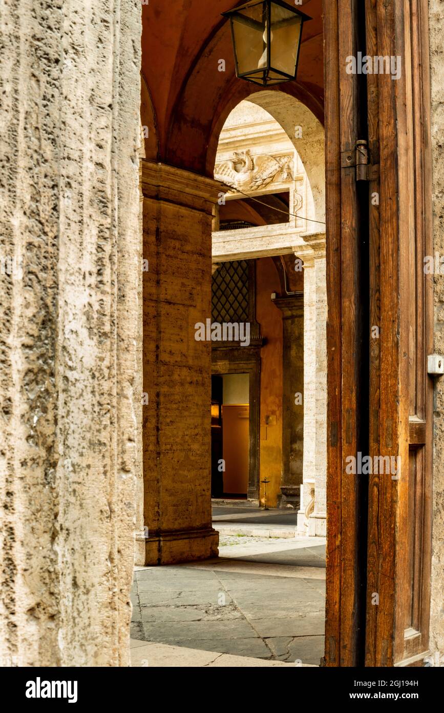 Italy, Rome. Corso del Rinascimento, Palazzo della Sapienza, multiple doorways. Stock Photo