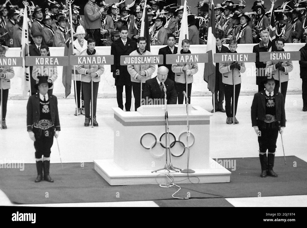 10 FEBRUARY 1964 AVERY BRUNDAGE, PRESIDENT OF THE IOC, ANNOUNCES THE END OF THE WINTER OLYMPICS GAMES DURING THE CLOSING CEREMONY IN INNSBRUCK, AUSTRIA Stock Photo