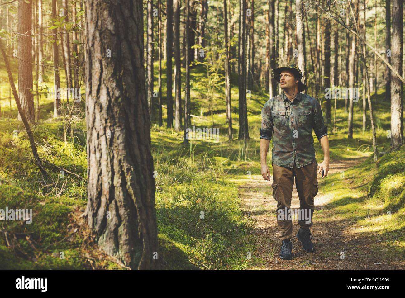 forest ranger or forester on the walk Stock Photo