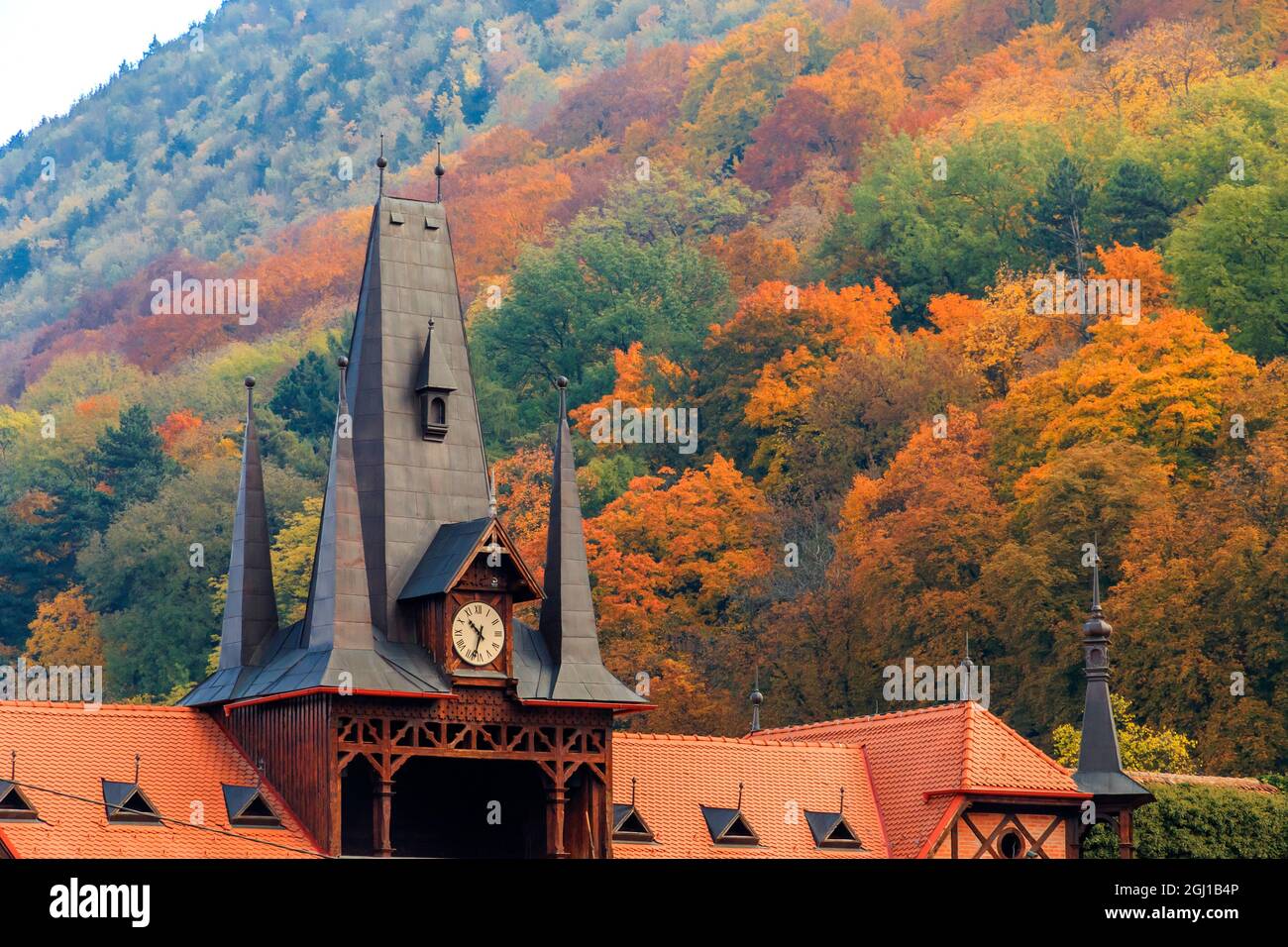 Europe, Romania, Brasov. Poarta Schei district. Olimpia Restaurant near George Street. Clock Tower, spires. Stock Photo