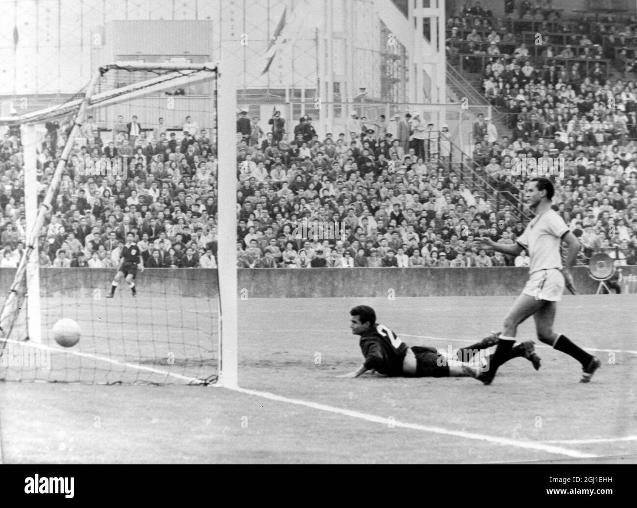 OLYMPICS, OLYMPIC SPORT GAMES THE XVIII 18TH OLYMPIAD IN TOKYO, JAPAN FOOTBALL IN ACTION