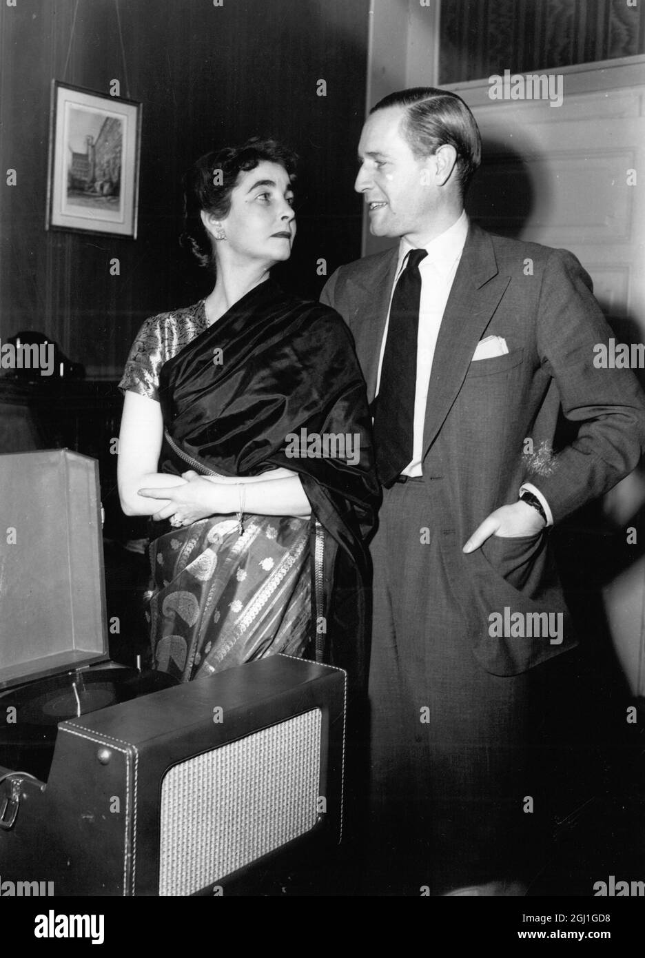 Gottfried von Cramm and Barbara Woolworth Hutton American socialite dressed in sari deny romance seen at von Cramm home 9 November 1951 Stock Photo