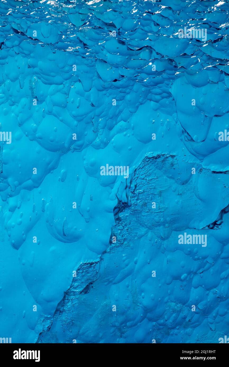 USA, Alaska, Tracy Arm-Fords Terror Wilderness, Close-up of deep blue iceberg floating near face of South Sawyer Glacier in Tracy Arm Stock Photo