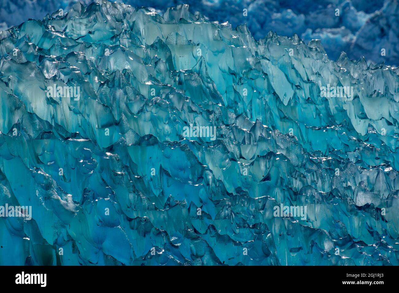 USA, Alaska, Tracy Arm-Fords Terror Wilderness, Close-up of deep blue iceberg floating near face of South Sawyer Glacier in Tracy Arm Stock Photo