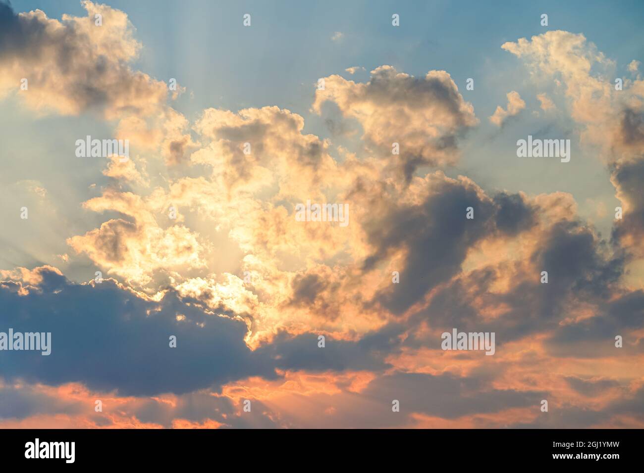 Natural orange sunset sky with beautiful clouds Stock Photo - Alamy