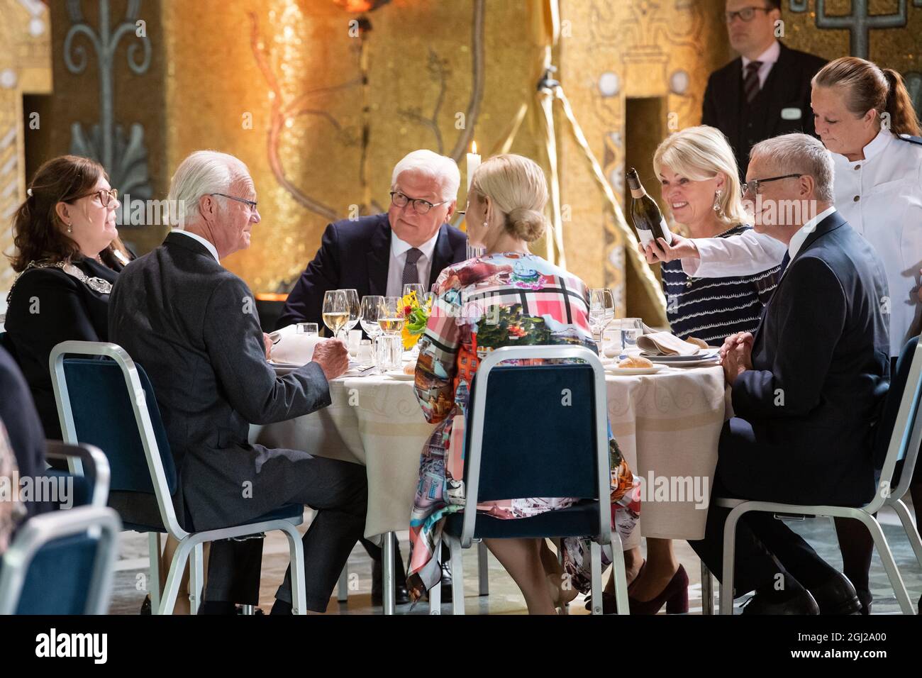 08 September 2021, Sweden, Södertälje: Federal President Frank-Walter Steinmeier (centre) sits with King Carl XVI Gustaf of Sweden (2nd from left) and Cecilia Brinck (l-r), Chairwoman of Stockholm City Council, Anna König Jerlmyr, Lord Mayor of Stockholm, Anna Hallberg, Swedish Minister for Trade, and Stephan Steinlein, Head of the Office of the Federal President, at a lunch in Stockholm City Hall. President Steinmeier and his wife are in Sweden on a three-day state visit at the invitation of the Swedish royal couple. Photo: Bernd von Jutrczenka/dpa Stock Photo