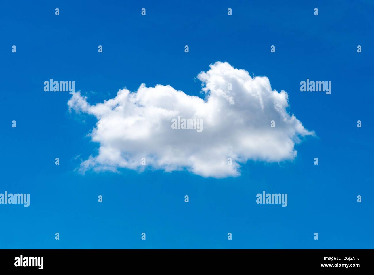 Nature single white cloud on blue sky background in daytime Stock Photo