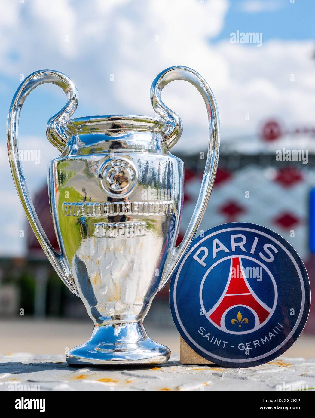 June 14, 2021 Paris, France. The emblem of the football club Paris  Saint-Germain F.C. and the UEFA Champions League Cup against the backdrop  of a mode Stock Photo - Alamy