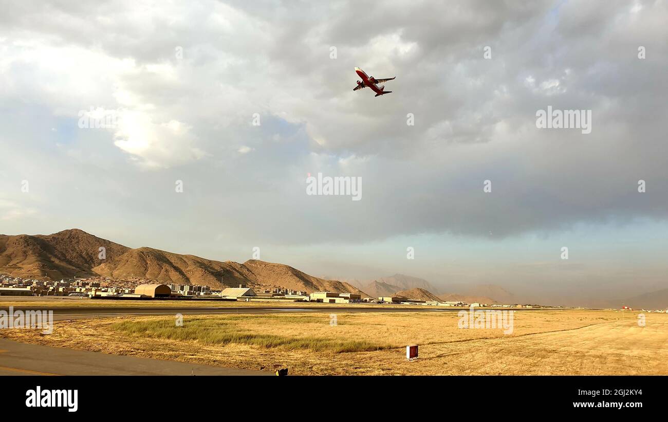 Kabul, Afghanistan, 29/06/19. Boeing 737 passenger aircraft departing from Hamid Karzai International Airport in Kabul during sunset. Stock Photo
