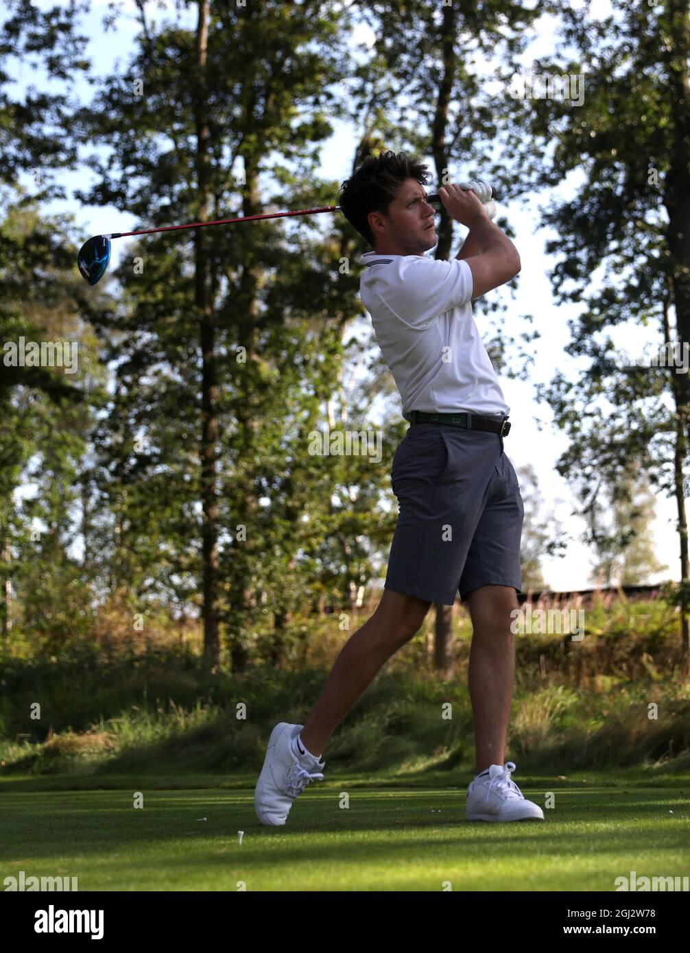 Niall Horan tees off on the 9th during the Pro-Am for the BMW PGA Championship at Wentworth Golf Club, Virginia Water. Picture date: Wednesday September 8, 2021. Stock Photo