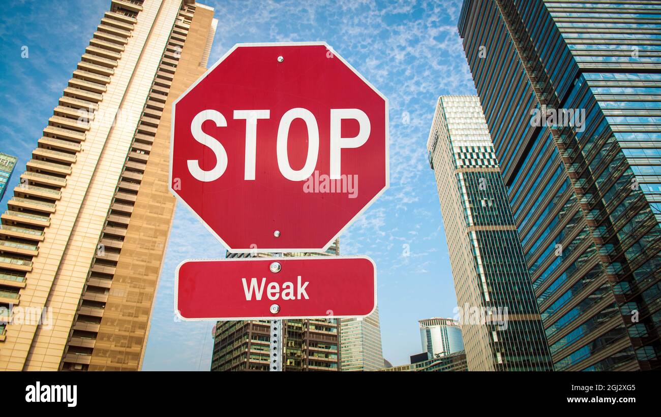 Street Sign the Direction Way to Powerful versus Weak Stock Photo - Alamy