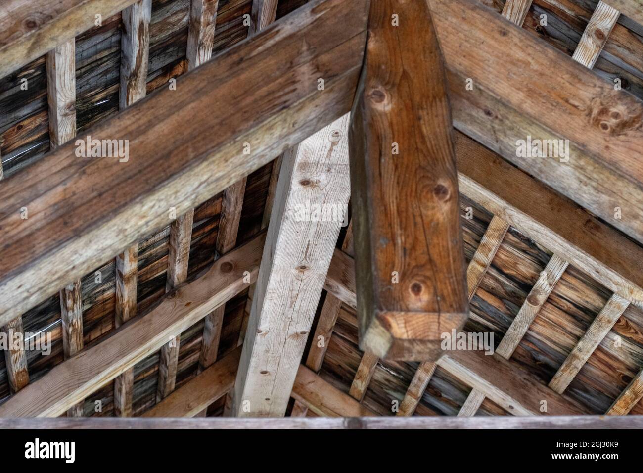 Particular roof of a wooden bridge. Stock Photo