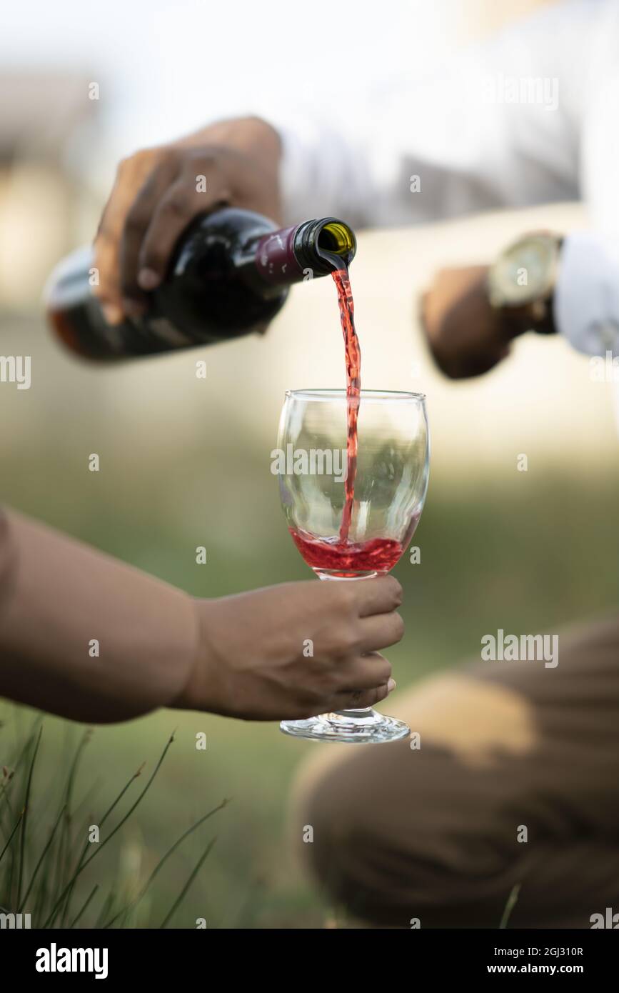 Alcohol men drinking red wine hi-res stock photography and images - Alamy