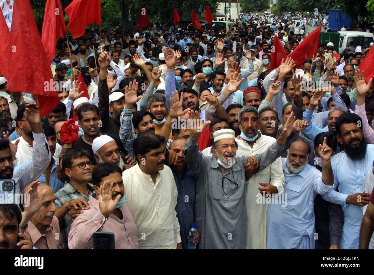Members of All Pakistan Workers Confederation are holding protest demonstration against privatization and price hike, at Lahore press club on Wednesday, September 08, 2021. Stock Photo