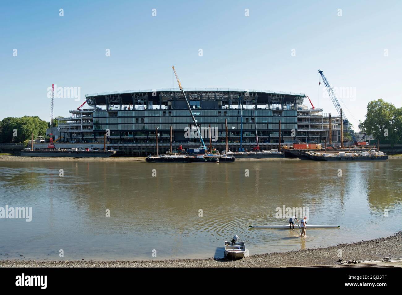 the riverside stand at craven cottage, home of fulham fc,  under contruction seen from barnes, southwest london, across the river thames Stock Photo