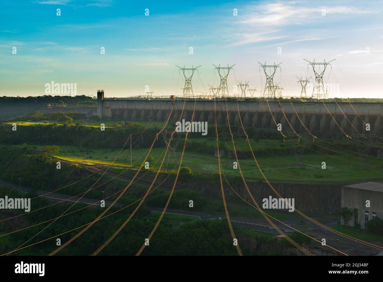 Power lines coming out from Itaipu Hydroelectric Dam Stock Photo