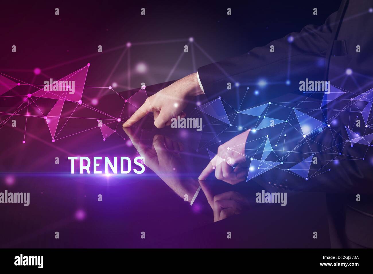 Businessman touching huge screen concept Stock Photo