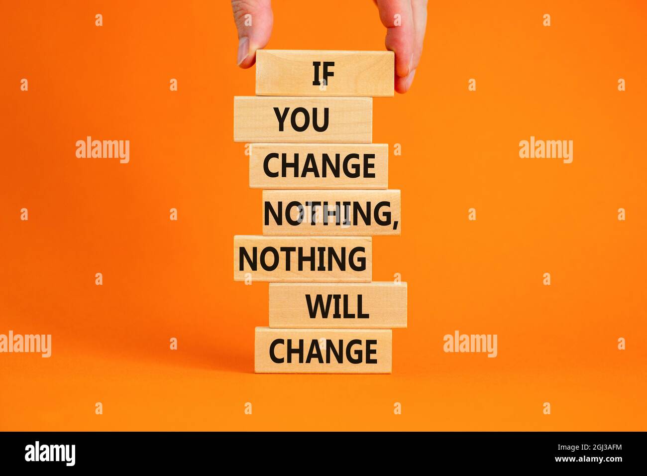 Change symbol. Wooden blocks with words 'If you change nothing, nothing